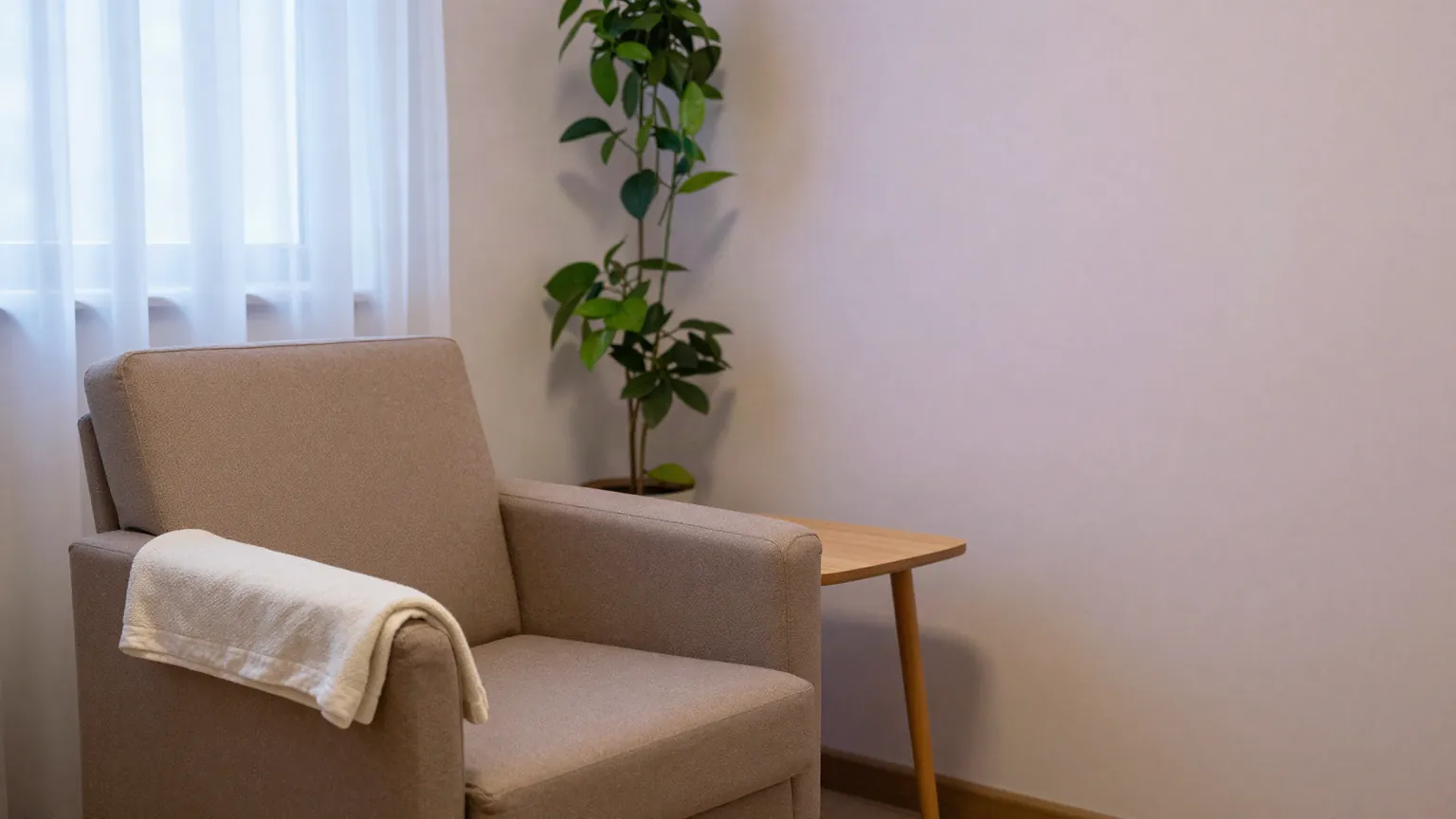 The clinic room, with a comfortable chair beside the window